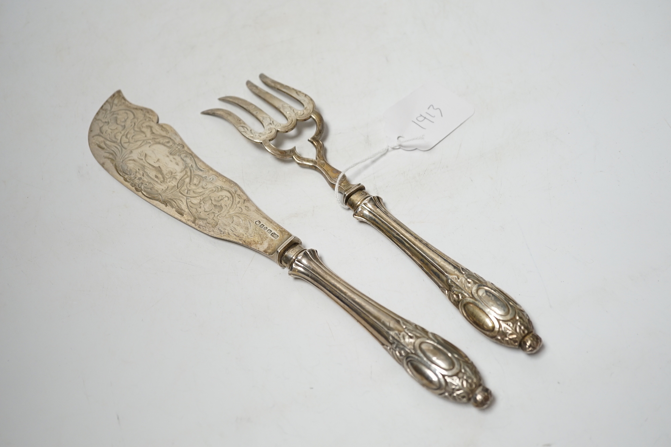 A pair of Victorian silver fish servers, maker, F.N., Sheffield, 1853/54, slice 30.8cm.